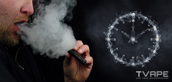 Un mec qui souffle un gros nuage de vapeur avec un stylo dab Tronian Gammatron.