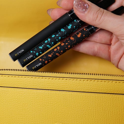 Tronian Pitron V2 mettant des stylos dans un sac à main